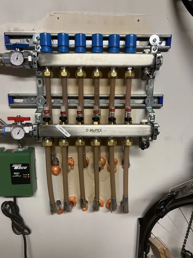 Plumber performing Water Heater Repair at a residential property in Paintsville